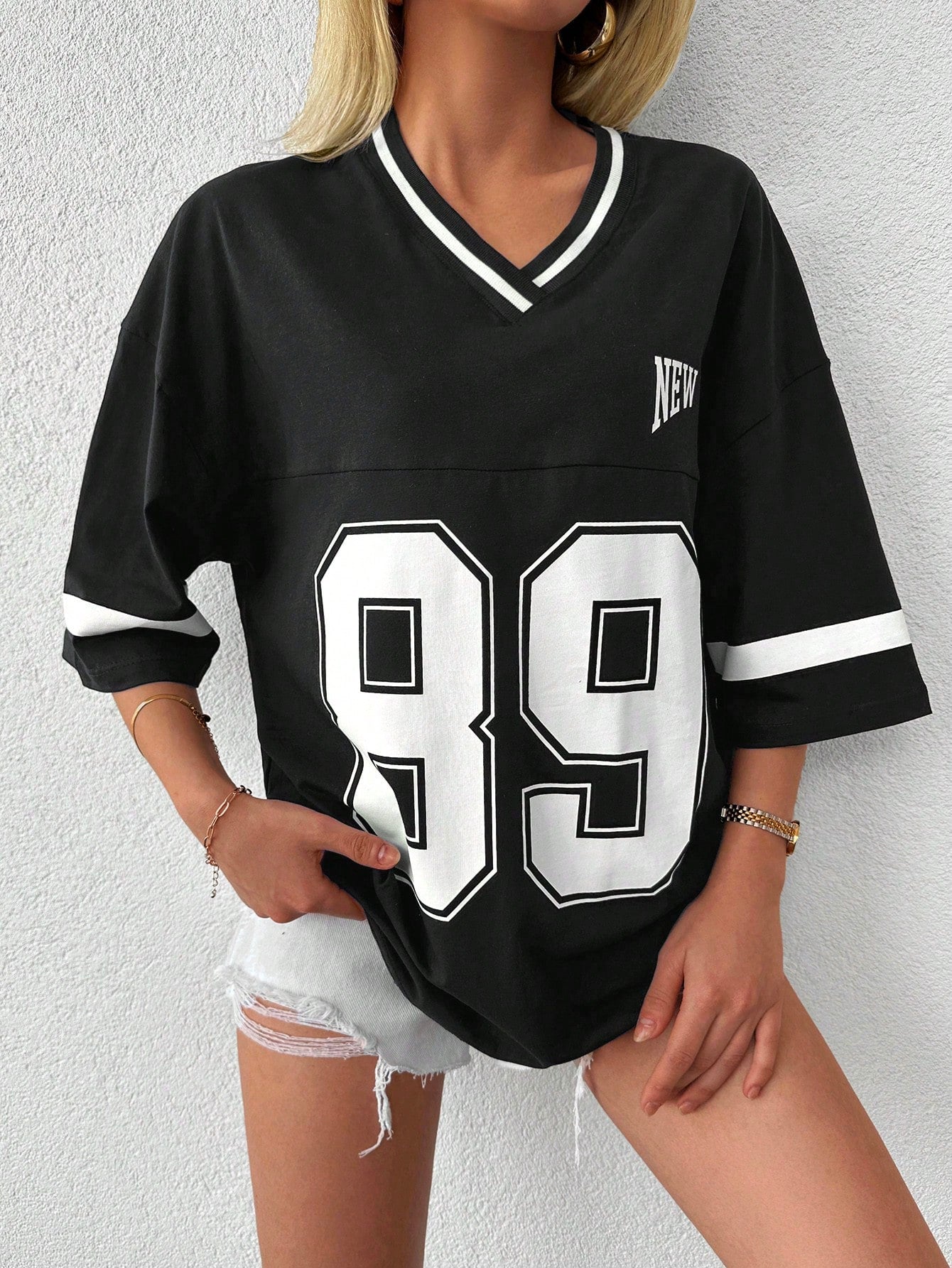 Dames oversized varsity t-shirt - relaxte pasvorm met sportieve details voor dagelijks casual gebruik