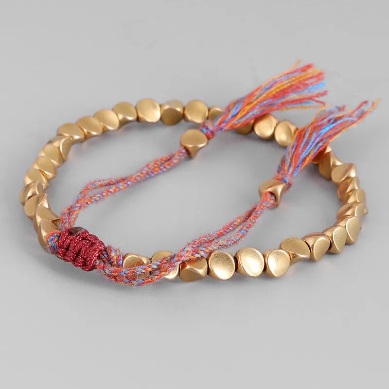Tibetaans boeddhistische harmonie armband - elegante gouden damesarmband - Bakkermode.nl