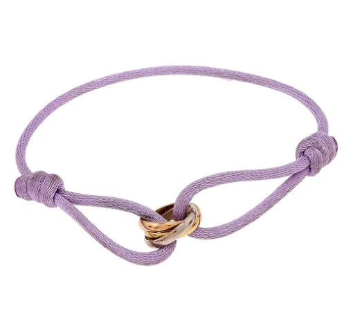 Élégance trinity armband - verfijnde damesarmband met gouden en zilveren accenten
