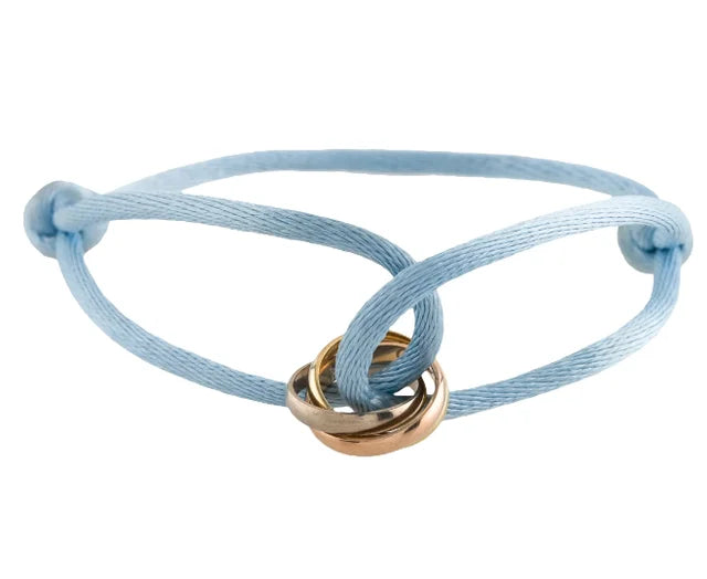 Élégance trinity armband - verfijnde damesarmband met gouden en zilveren accenten