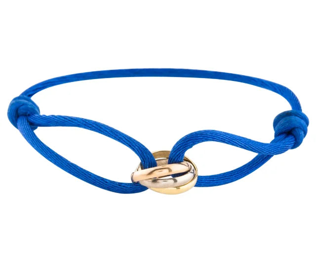 Élégance trinity armband - verfijnde damesarmband met gouden en zilveren accenten