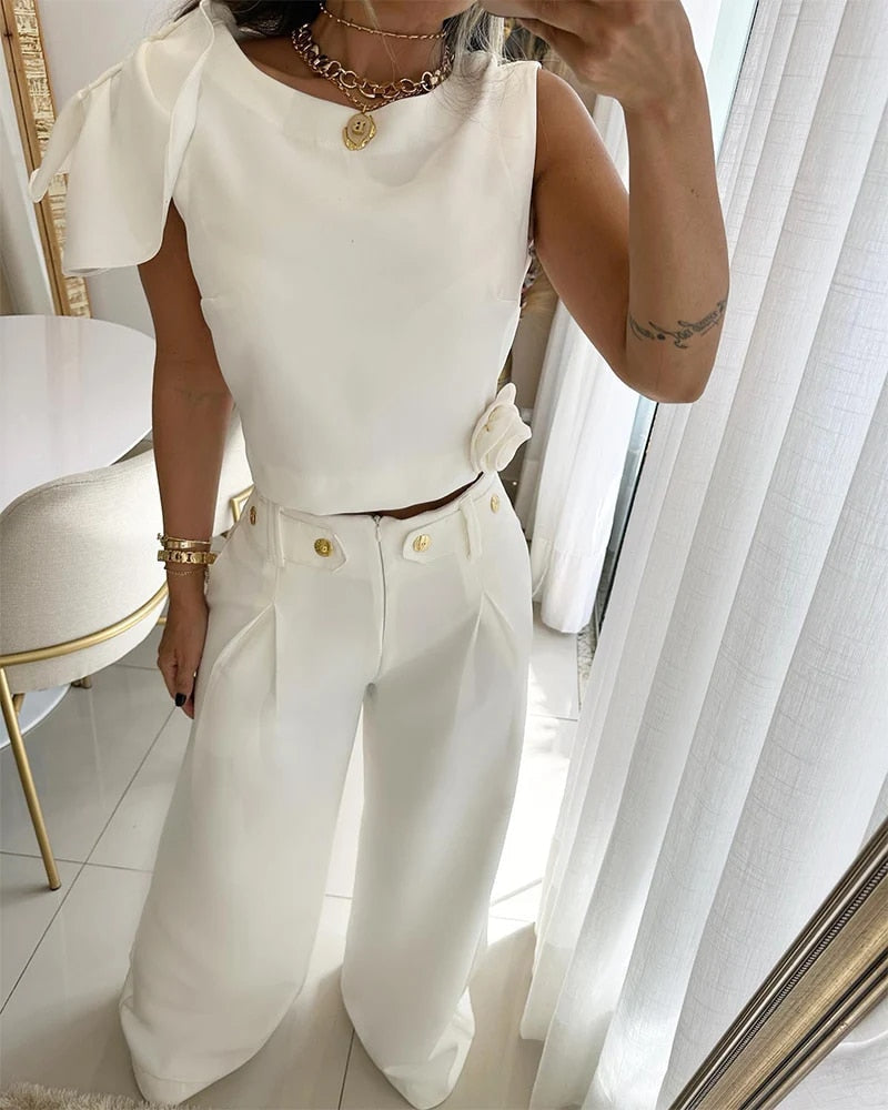 2-delige dames top en wijde broek - chique avondmode met een stijlvolle crop top set en unieke schouderdetails