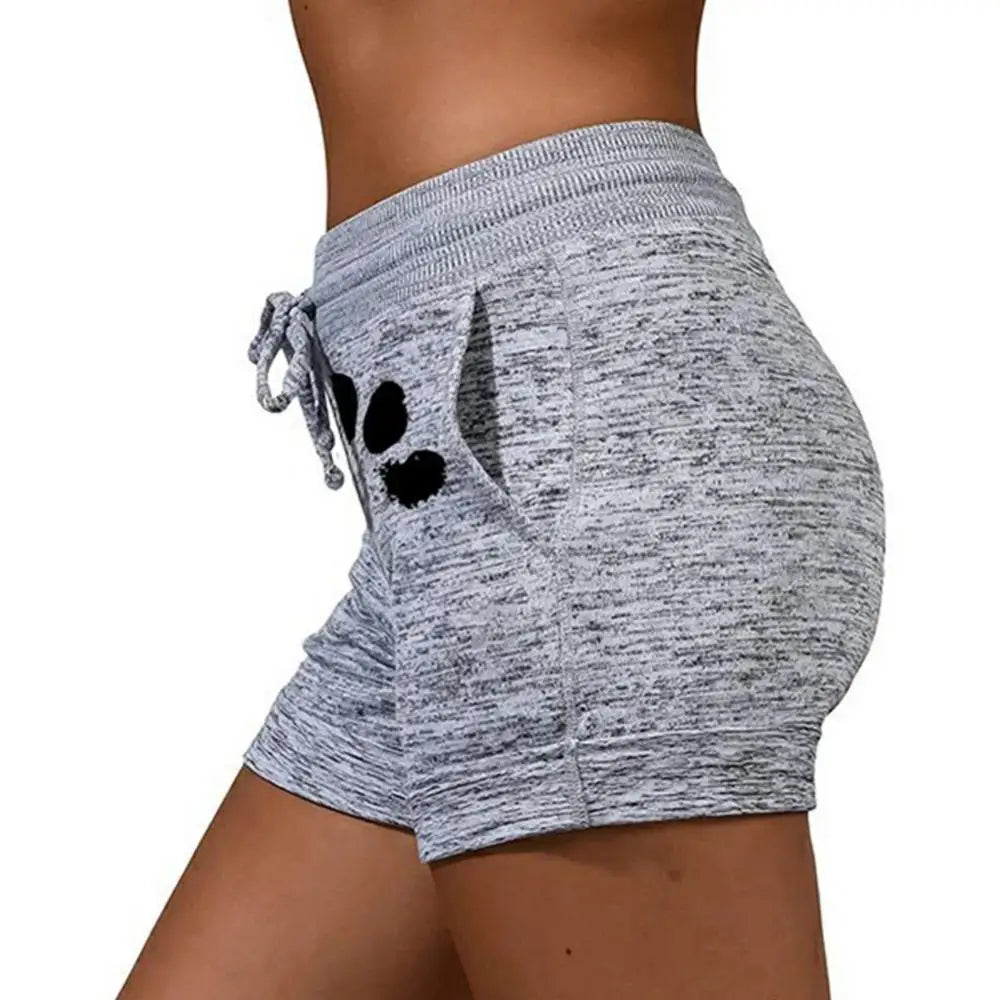 Sportieve shorts met pootafdrukken - Bakkermode.nl