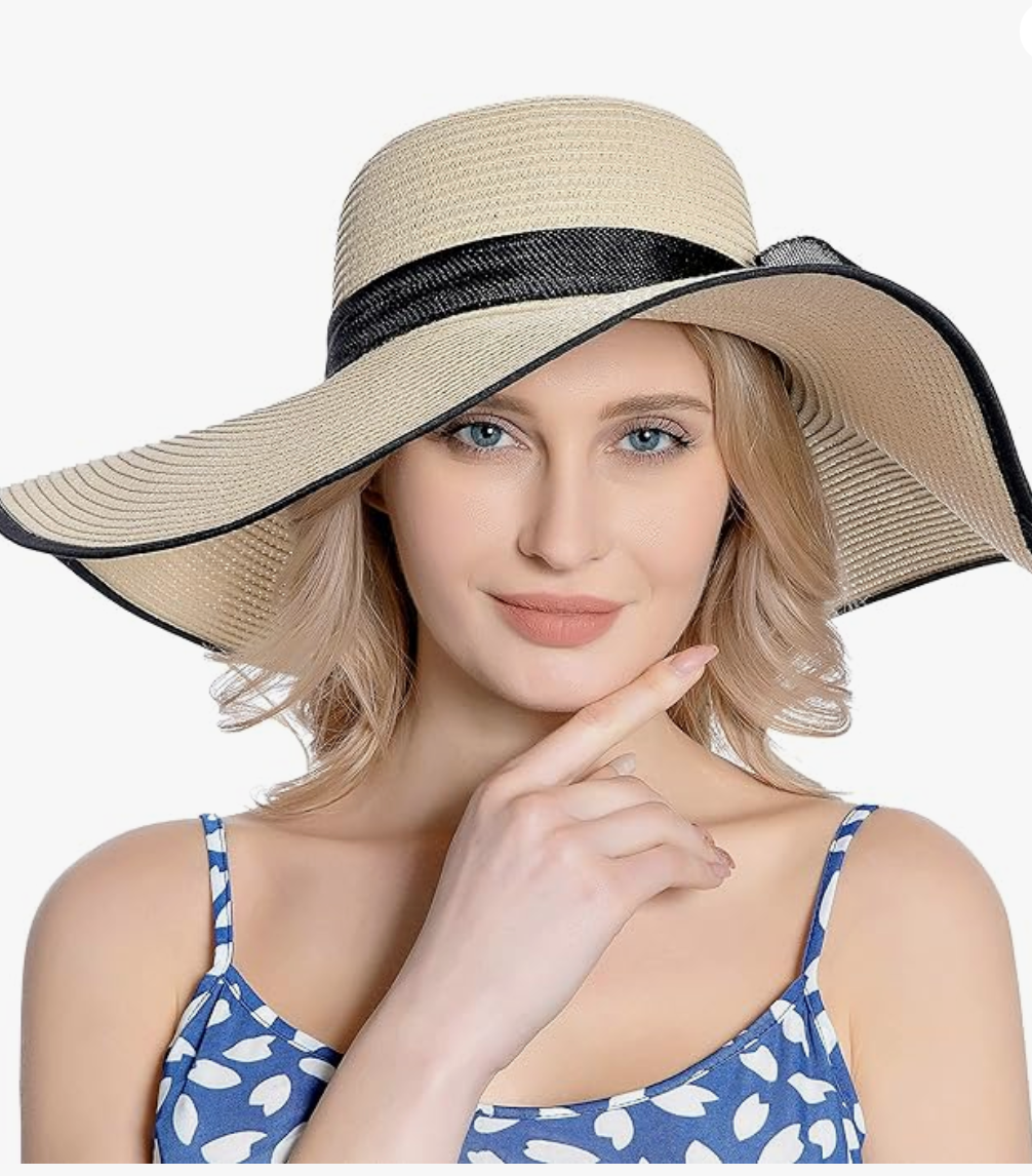 Brede rand zonnehoed met strikdecor voor op het strand - Bakkermode.nl