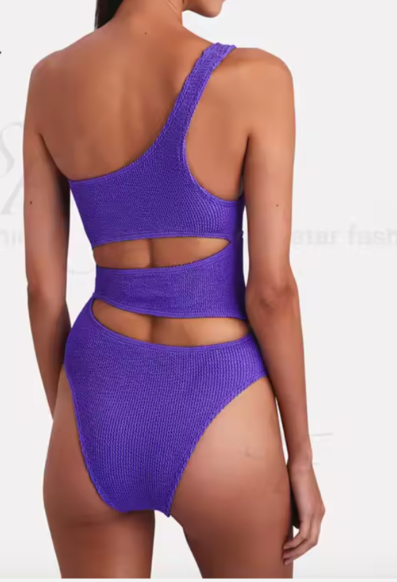 Paarse asymmetrische badpak met uitsparingen - Bakkermode.nl