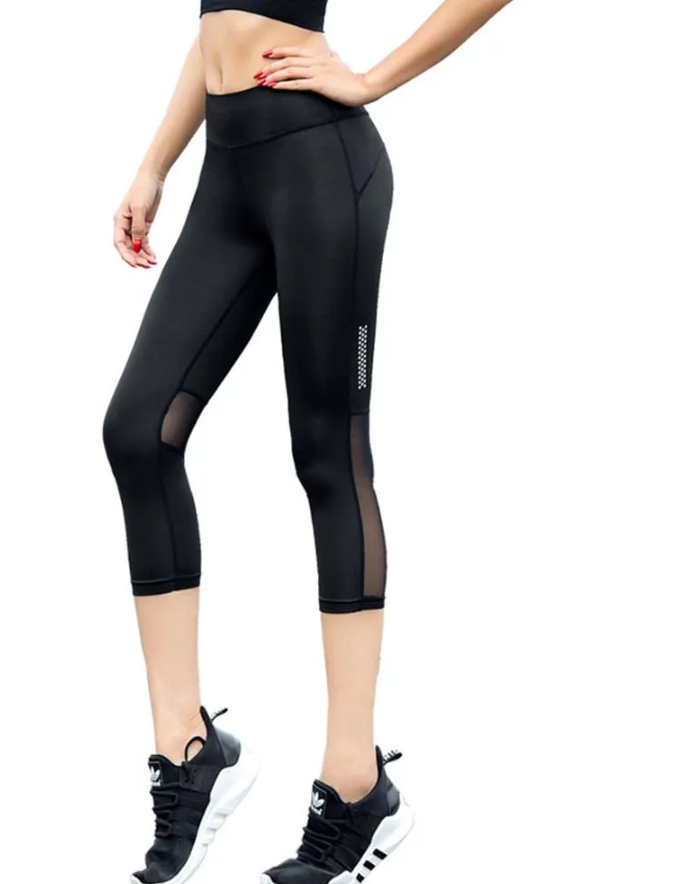 Sportieve zwarte legging met mesh inzetstukken - Bakkermode.nl