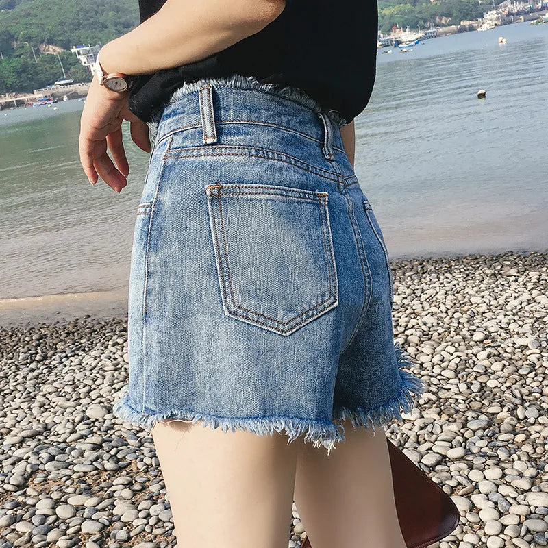 Hoge taille denim shorts met rafels - Bakkermode.nl