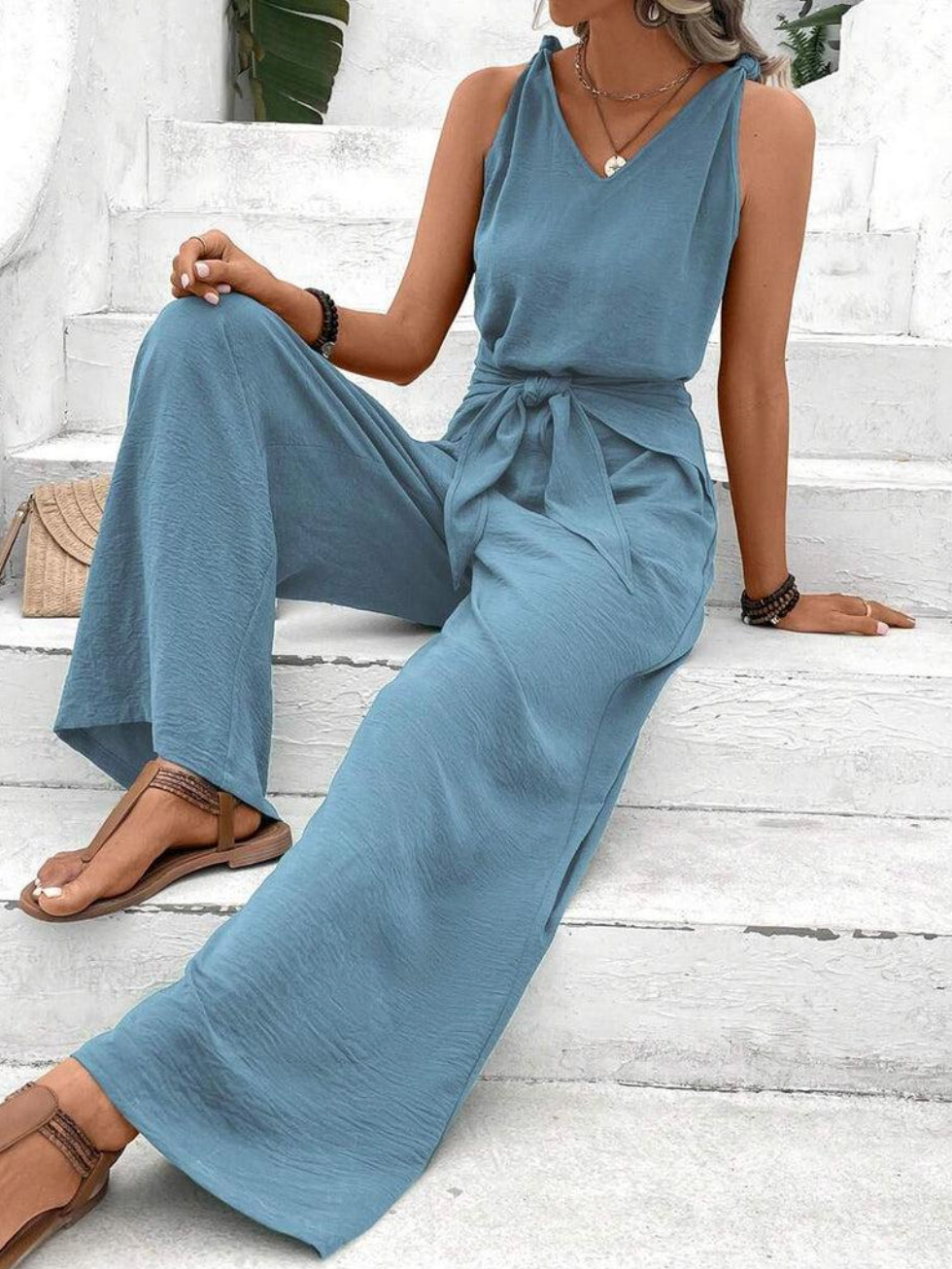 Dames casual jumpsuit - elegante blauwe lange broek voor zomerse uitjes - luchtige stof, flatterend strikdesign
