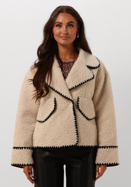 Teddy jas dames – warme oversized winterjas in beige met zwarte accenten - Bakkermode.nl