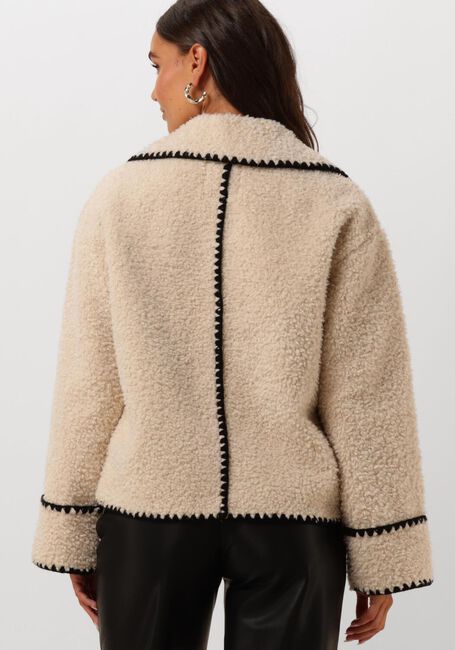 Teddy jas dames – warme oversized winterjas in beige met zwarte accenten - Bakkermode.nl