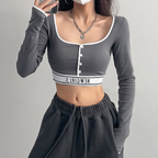 Geribbelde knoopcrop top - stijlvolle dames top met lange mouwen