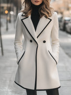 Dubbelzijdige duster - elegante damesjas met zwarte accenten