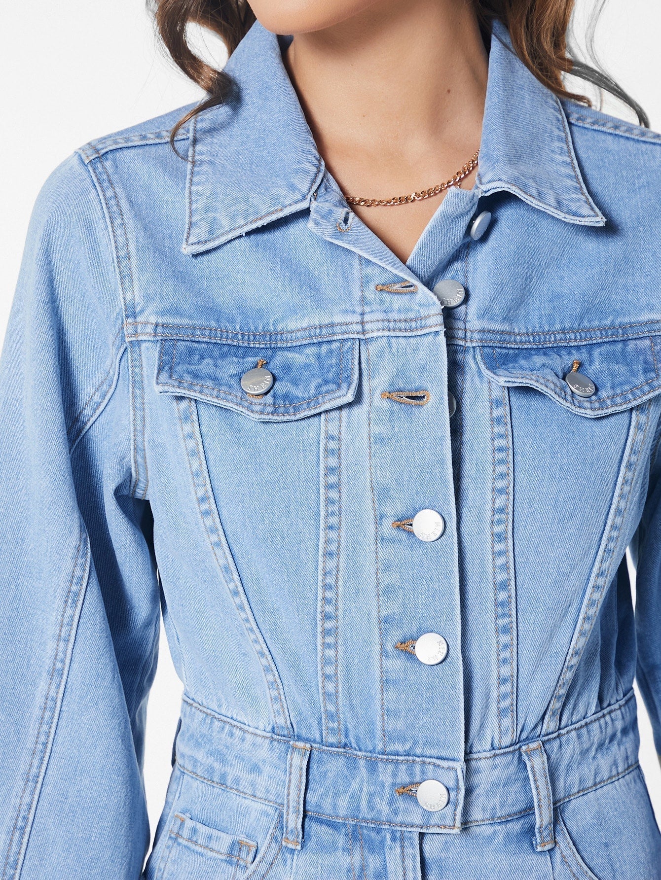 Denim jumpsuit met klepzakken - stijlvolle blauwe dames overall