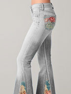 Flared jeans met vintage bloemenprint - dames stijlvolle denim broeken