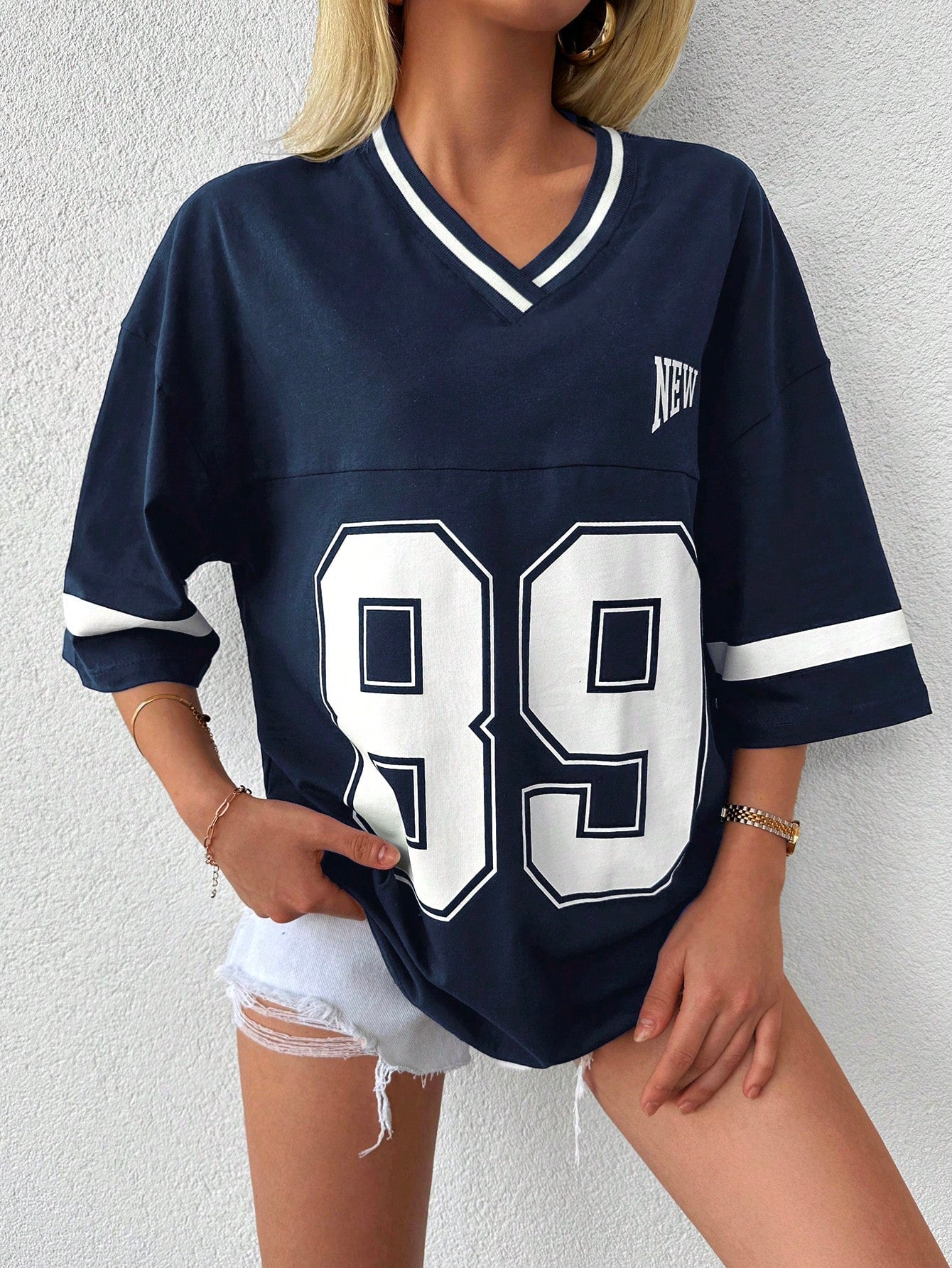 Dames oversized varsity t-shirt - relaxte pasvorm met sportieve details voor dagelijks casual gebruik