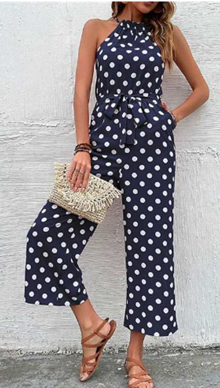 Dames polkadot jumpsuit - elegante marineblauwe lange jumpsuit met strik taille