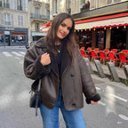 Herfst en winter losse bontjas - warme damesjas met lederen details - Bakkermode.nl