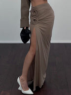 Bruine maxi-rok met hoge split en ringdetails - Bakkermode.nl