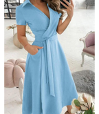 Midi wikkeljurk - verfijnde groene jurk met strik taille