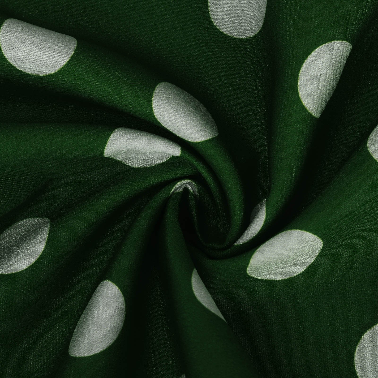 Groene jumpsuit met stippen - trendy halternek ontwerp voor dames