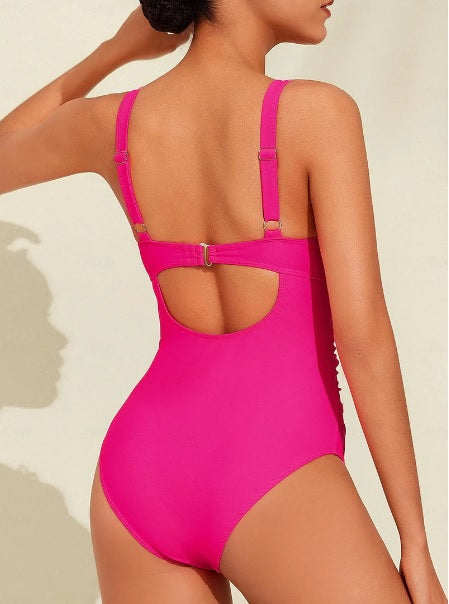 Roze badpak met sierlijke details en open rug - Bakkermode.nl