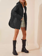 Gewatteerde puffer zwarte en beige winterjas voor dames - warm en oversized - Bakkermode.nl