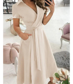 Midi wikkeljurk - verfijnde groene jurk met strik taille