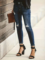 Diepblauwe distressed skinny jeans - trendy dames denimbroek