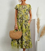 Bloemenprint maxi jurk voor dames - casual met elegante korte mouwen en handige zakken