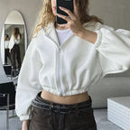 Cropped hoodie - korte sweater voor dames met ritssluiting en ballonmouwen - Bakkermode.nl