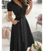 Midi wikkeljurk - verfijnde groene jurk met strik taille