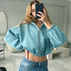 Cropped hoodie - korte sweater voor dames met ritssluiting en ballonmouwen - Bakkermode.nl