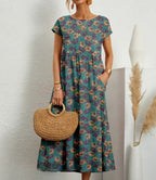 Bloemenprint maxi jurk voor dames - casual met elegante korte mouwen en handige zakken