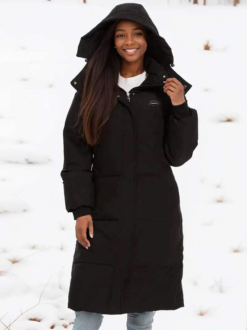 Zwarte lange winterjas met capuchon voor dames – isolerend en comfortabel - Bakkermode.nl