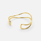 Vrouwen gouden cuff bracelet - stijlvolle open accessoire voor avondkleding