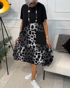 Casual jurk - chique zwart en grijze damesjurk met zakken