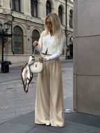 Dames brede pantalon met hoge taille - stijlvolle kantooroutfit voor elegante werklooks