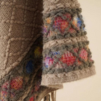 Boho-geïnspireerde poncho - stijlvolle gebreide wrap voor dames