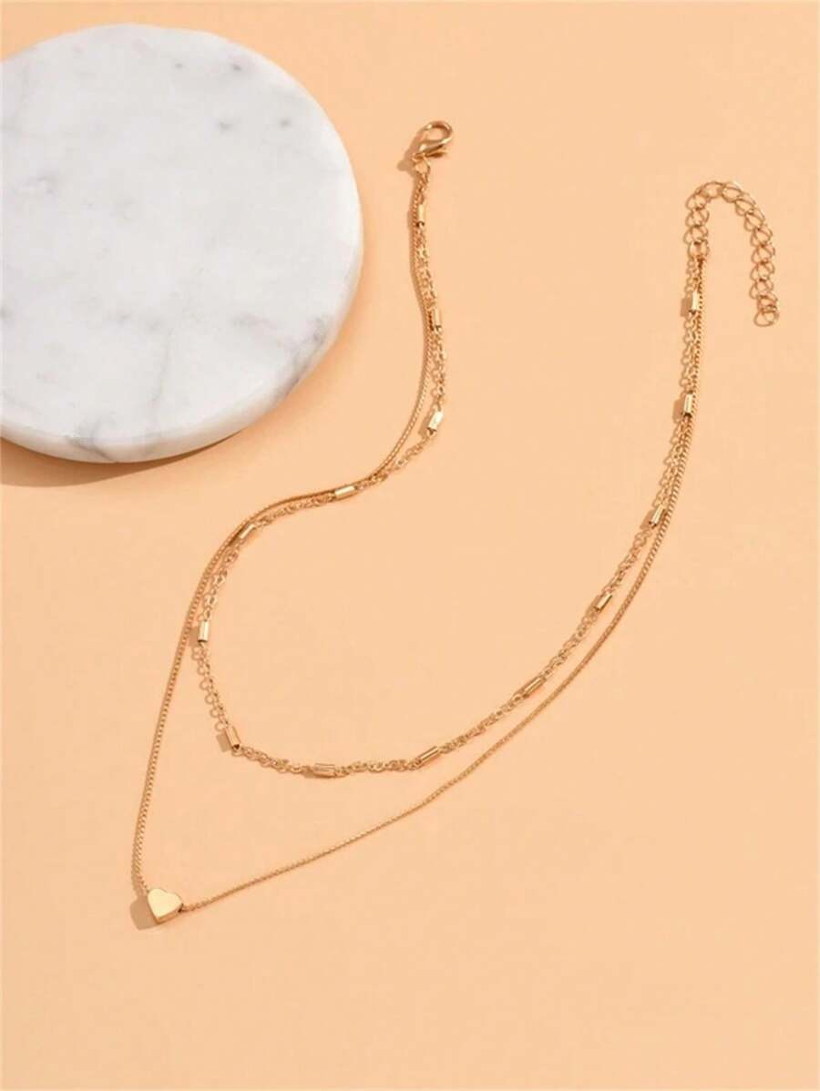 Gouden hart hanger ketting - elegante gelaagde damesjuwelen