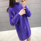 Chique gebreide sweaterjurk met lange mouwen en geborduurde details