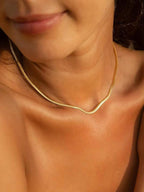 Gouden herringbone ketting - elegante damesaccessoire