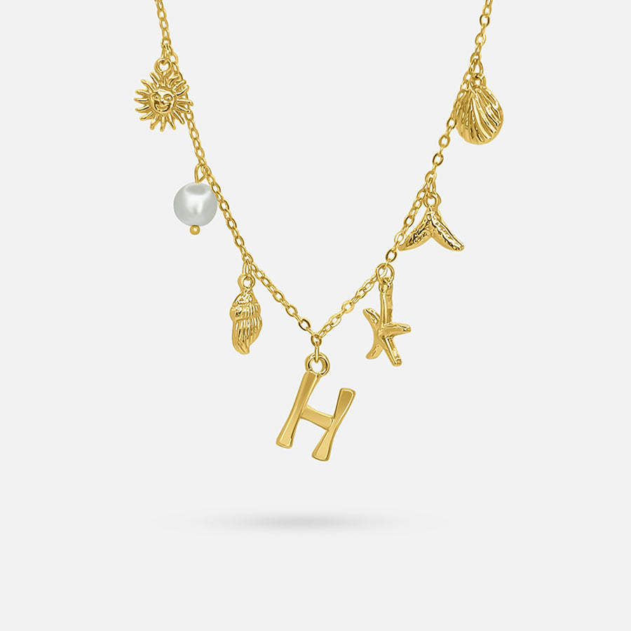 Dames gouden bedelketting met initiaal 'h' en zeethema-elementen - gepersonaliseerde sieraden