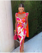 Dames midi-jurk met bloemenprint en rimpels in roze en oranje - elegante avondoutfit