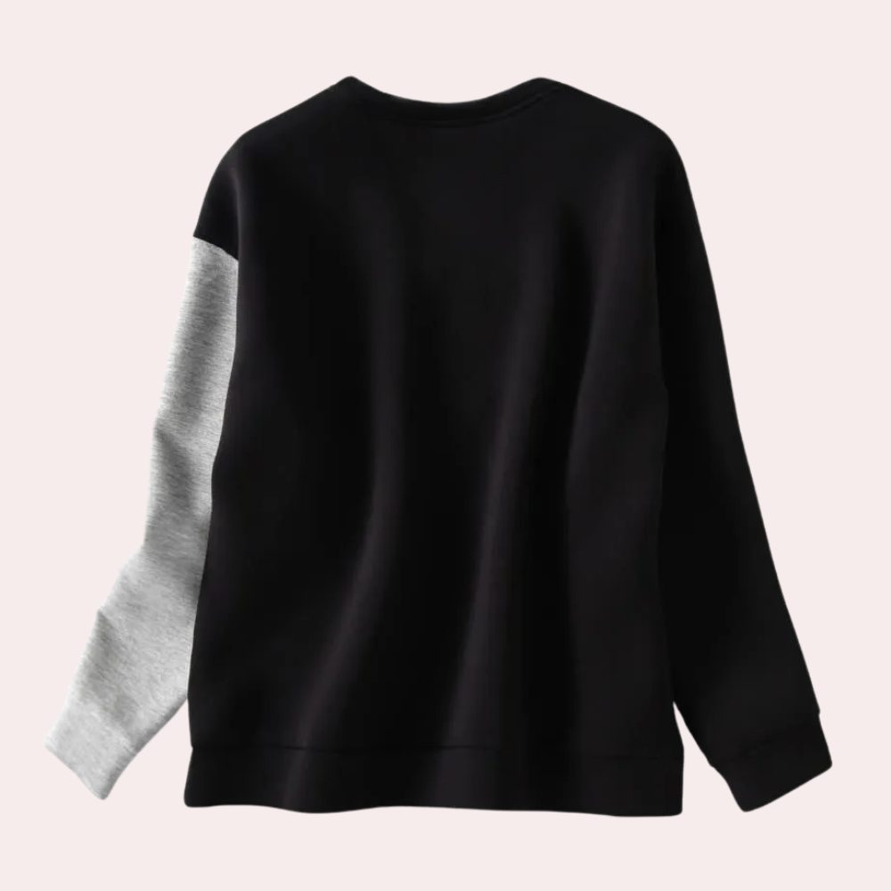 Zwarte luxe sweatshirt - stijlvolle dames trui met vleugeldetail
