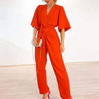 Dames jumpsuit met wikkelstijl voor avondkleding - chique lange mouwen, elegante uitstraling