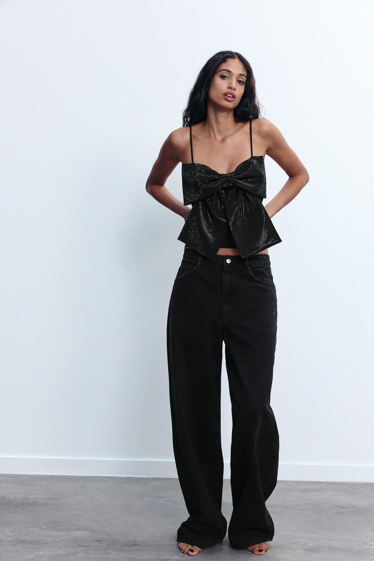 Dames tops met elegante strikdetails - zwarte glitter blouse voor avondsfeestjes