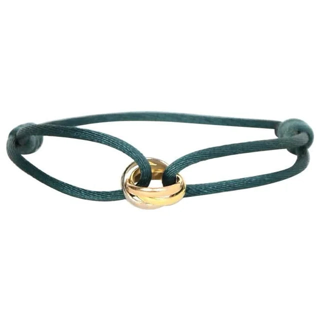 Élégance trinity armband - verfijnde damesarmband met gouden en zilveren accenten