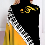 Cape blouse - stijlvolle dames top in zwart en geel met piano ontwerp