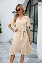 Wikkeljurk - elegante damesjurk met strikdetail