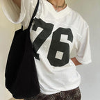 Oversized t-shirt - casual dames t-shirt met 76-print